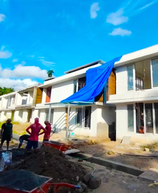 Villas nearing completion in Porvorim, with exterior finishing and site works in progress